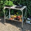 Kweekrek met houten dek